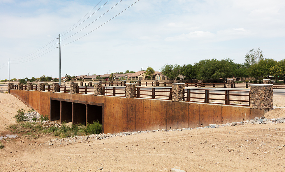 image of a road bridge over a flood wash.