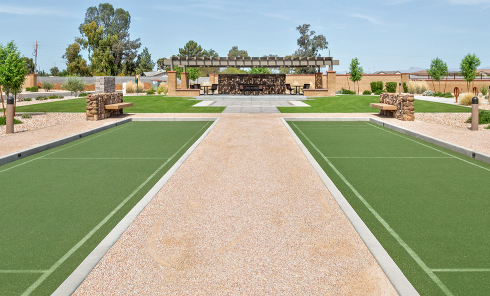 image of community area with grills and sports courts.