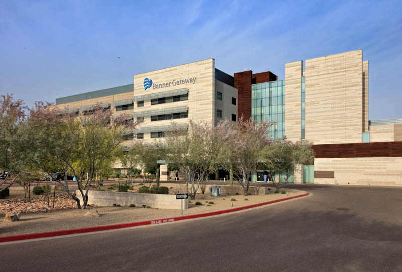 Image of a tan stone building that says "Banner Health."