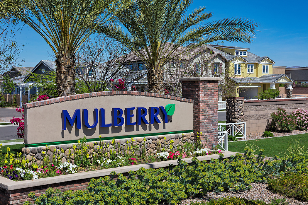 image showing an entry monument that says "Mulberry" in blue letters.