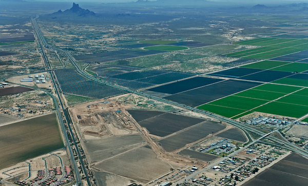 Aerial view showing a large plot of land to be a wallboard plant.