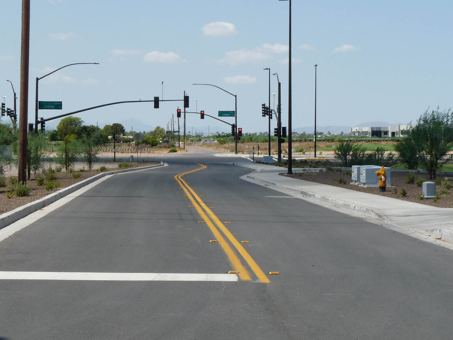Image of Pecos Road in Gilbert, AZ with completed construction.